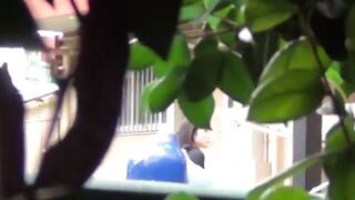 Camera films stunners spraying piss outdoors in daylight