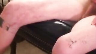 Bearded tattooed mature guy strokes cock and cums on self