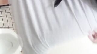 Closeup of young Japanese girls peeing in public toilet scenes