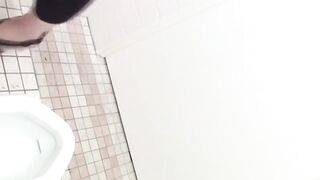 Japanese girls unaware of being filmed while they are peeing