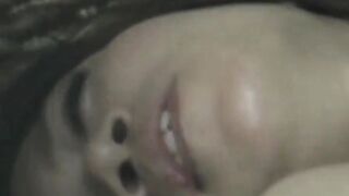 Japanese woman unknowing as she entertains herself on tape