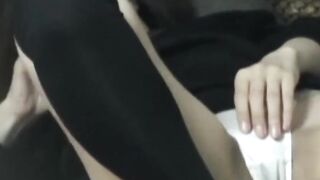 Japanese woman unknowing as she entertains herself on tape