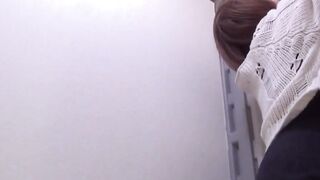 Asian girls pour golden from bushy vag into urinal spot