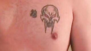 Inked middle aged guy cums on plate after jerking off