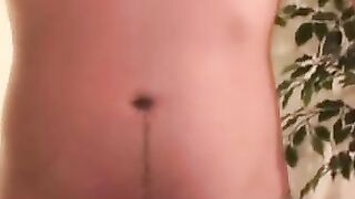 Inked middle aged guy cums on plate after jerking off