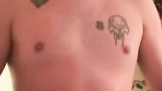 Inked middle aged guy cums on plate after jerking off