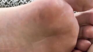 Nathan L shows off smooth soles after a tough shift