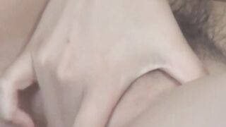 Japanese girl indulges in herself while a voyeur takes it all in
