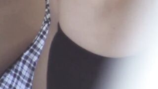 Japanese girl indulges in herself while a voyeur takes it all in