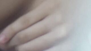 Japanese girl indulges in herself while a voyeur takes it all in