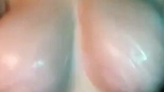 Big, Natural Tits Covered in Lotion on Webcam