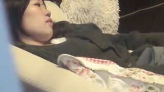Japanese babe filmed while having fun during masturbation