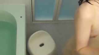 Japanese girl behaves naughtily while being observed