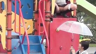 Naughty Students Use Open Umbrellas To Capture Golden Shower