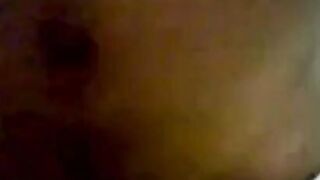 Asian Couple Sharing Intimate Moments in Bed