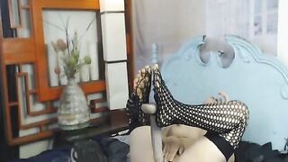 Big-Titted Camgirl Rides Her Huge Dildo