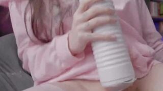 Hot TS strokes her big cock with a Fleshlight