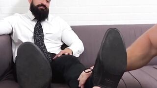 Eddie Cambio relaxes during his roommateâs feet worship