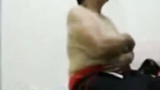 Old Asian Lady Dresses After Intimate Encounter