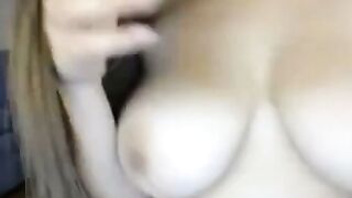 Big-Tit Brunette Teases in Panties on Webcam