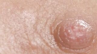 Big-Titted Brunette Oils Up Her Massive Breasts