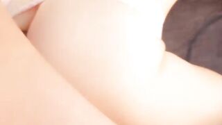 Brunette beauty's ass fingered hard by tattooed guy on couch