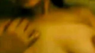 Asian beauty seduces her partner on stairs in passionate lovemaking
