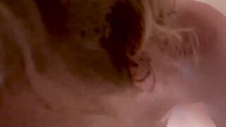 Curly Blonde MILF Strips And Gives Wet Shower Blowjob