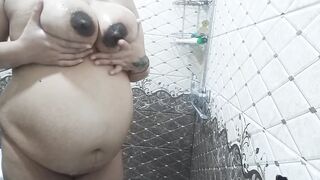 Pregnant fiance taking a shower