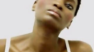Black Beauty Teases Webcam With Big Tits And Oiled Legs