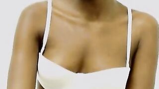 Black Beauty Teases Webcam With Big Tits And Oiled Legs
