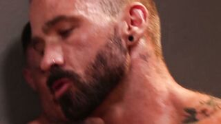 Two dominant dudes fist Ian Sterlings ass while another sucks his cock