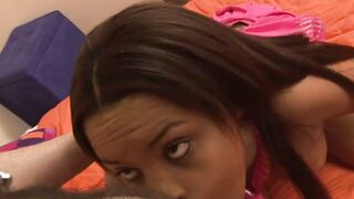 Izces Divine Sucks Cock in Pink Outfit on Orange Bed