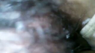 Close-up of Wet Pubic Hair Being Parted by Hand