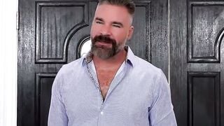 Bearded Man in Shirt Watches Nude Woman by Pool