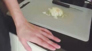 Brunette in Kitchen Gives Naughty Blowjob