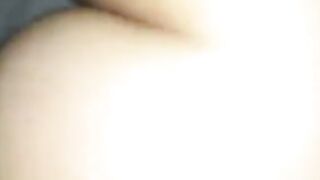 Close-up of Smooth Bare Skin and Hand Touching Thighs