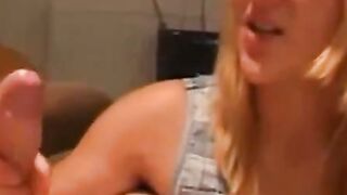 Blonde Woman Gives Foot Job on Couch with Tank Top