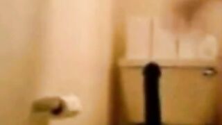 Swedish Amateur Sucks Big Black Dildo in Bathroom