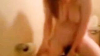 Swedish Amateur Sucks Big Black Dildo in Bathroom
