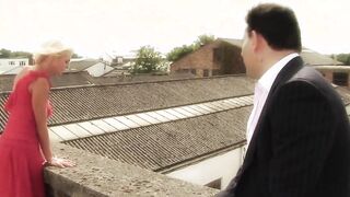 Elegant Cutie sits on a huge penis while other guys play