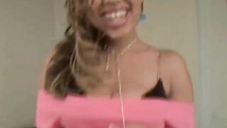Masturbating black teenie touches herself