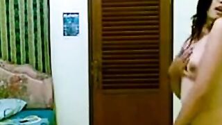 Indonesian Babe Strips in Yellow Top for Horny Joged Dance