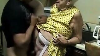 Granny in Yellow Polka Dot Dress Gets Doggy Fucked by Young Stud