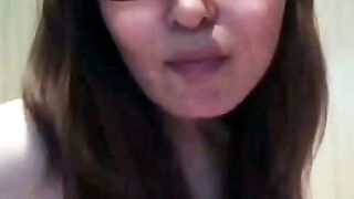 Asian Girl Deepthroats White Dildo on Webcam
