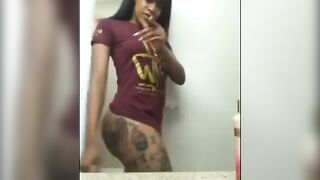 Black Babe Twerking in Maroon Tee with Big Booty and Tattoos
