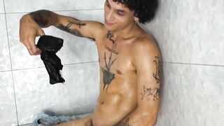 Tattooed Latino Boy Gets Passionate Handjob in Wet Shower
