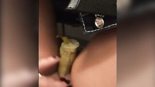 Naughty Wife Strokes Banana Between Her Legs on Plane