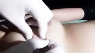 Gloved Hands Clamps Mature Woman's Clit for Painful Piercing Sex Tape