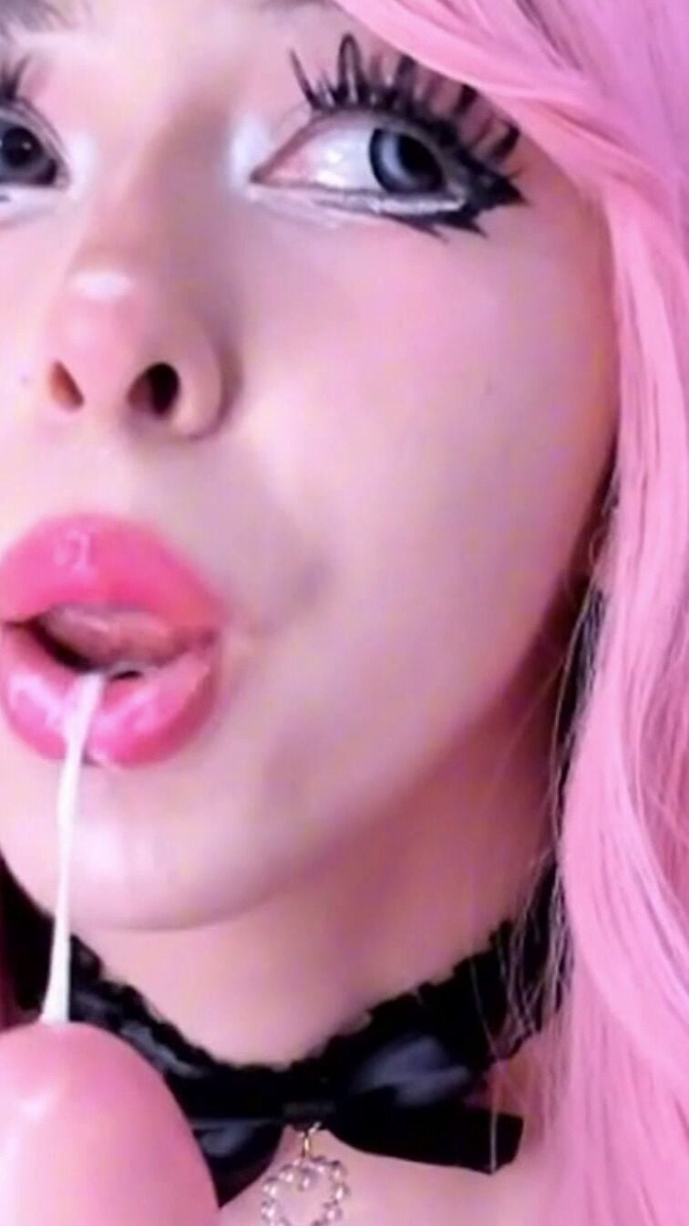 Pink Hair Babe Sucking Dildo With White Cum Dripping From Lips